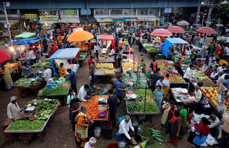 India's November retail inflation eases, boosts rate cut hopes